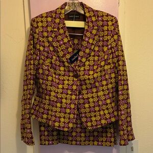 Great suit. Jacket says size 10 and skirt 12 but seems more like a 10 also